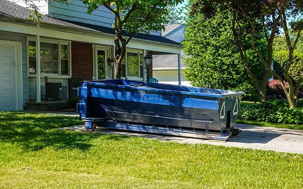 the waste in a residential dumpster is taken to a landfill or recycling center for disposal or processing